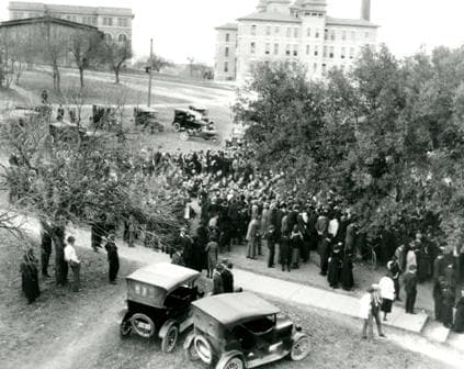 A crowd gathers for Pig's funeral